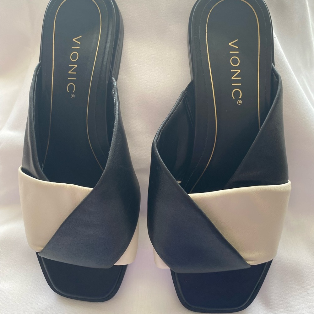 Vionic Black and Cream Mules with Modern Design